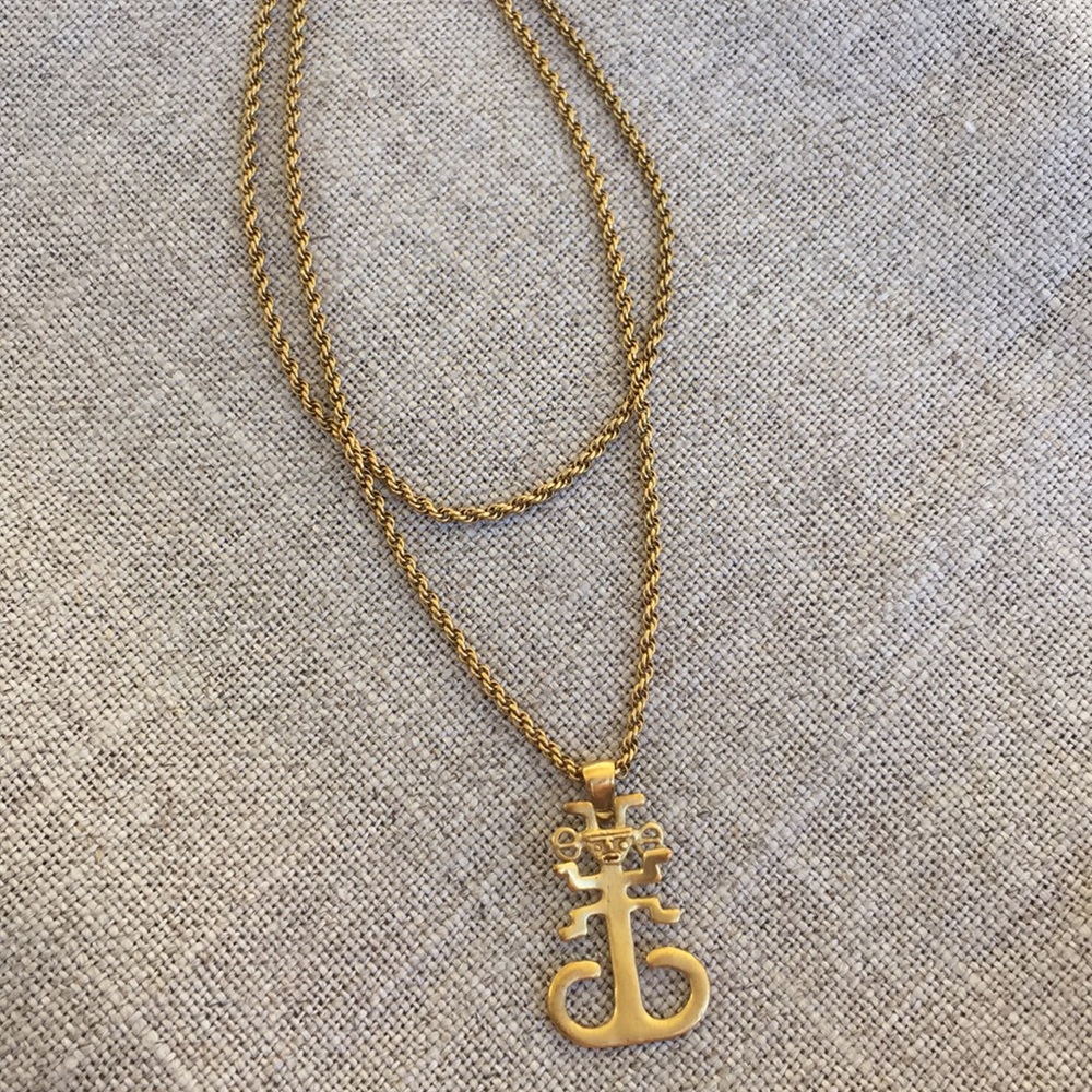Peruvian gold pendant necklace.